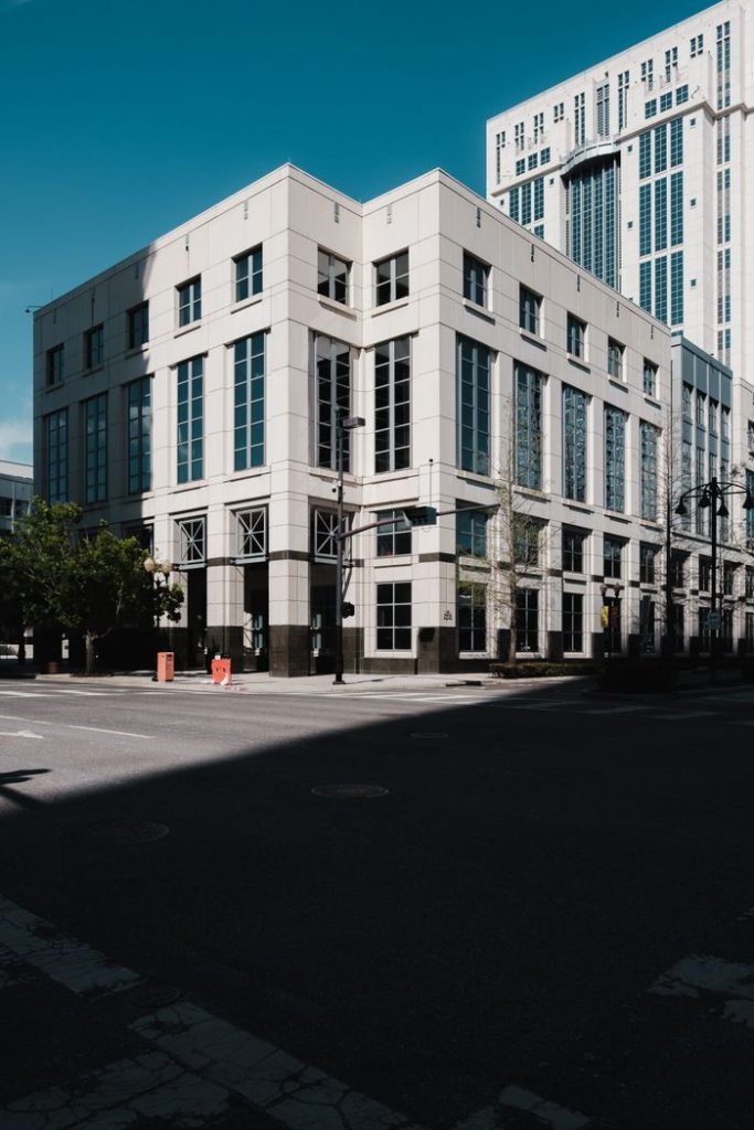 A modern courthouse building in downtown Orlando, showcasing contemporary architecture and city street view.